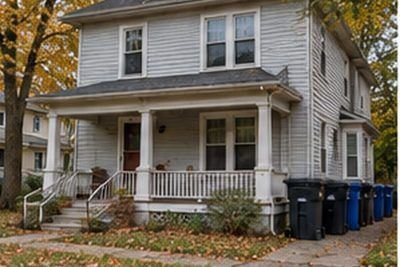Exterior of a converted older rental house near the University of Delaware campus in Newark